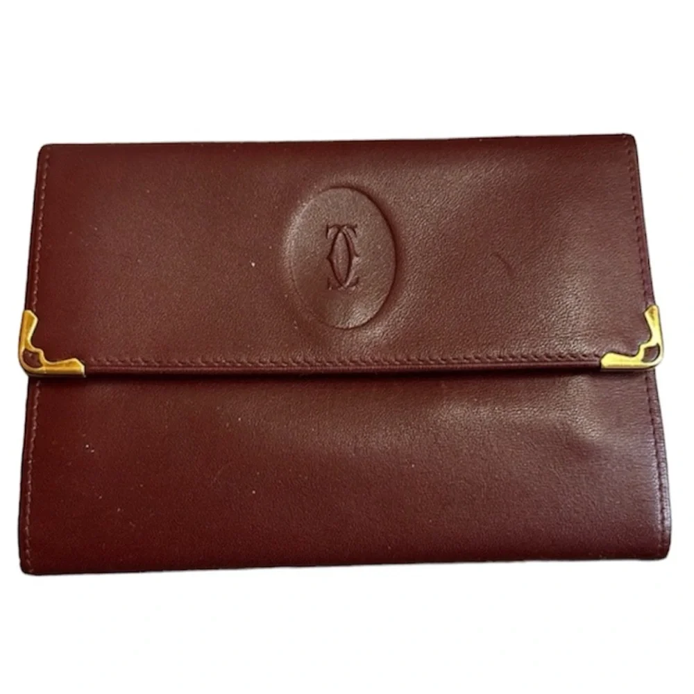 Cartier Paris  Burgandy Calfskin Vintage Wallet, Kisslock Coin Compartment. COA